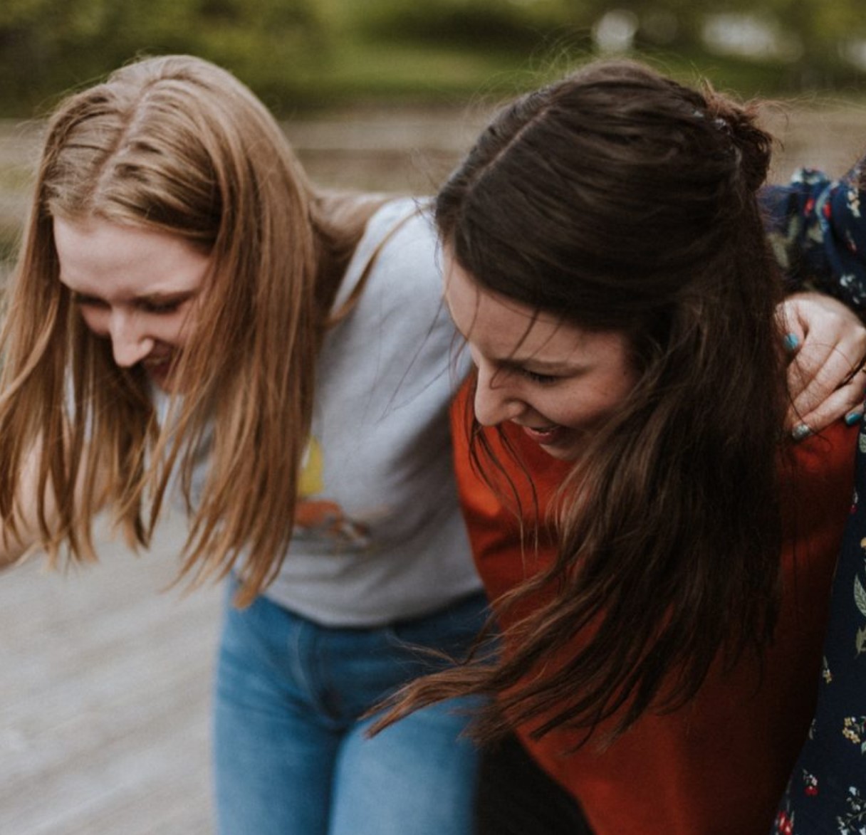 two teen girls laughing
