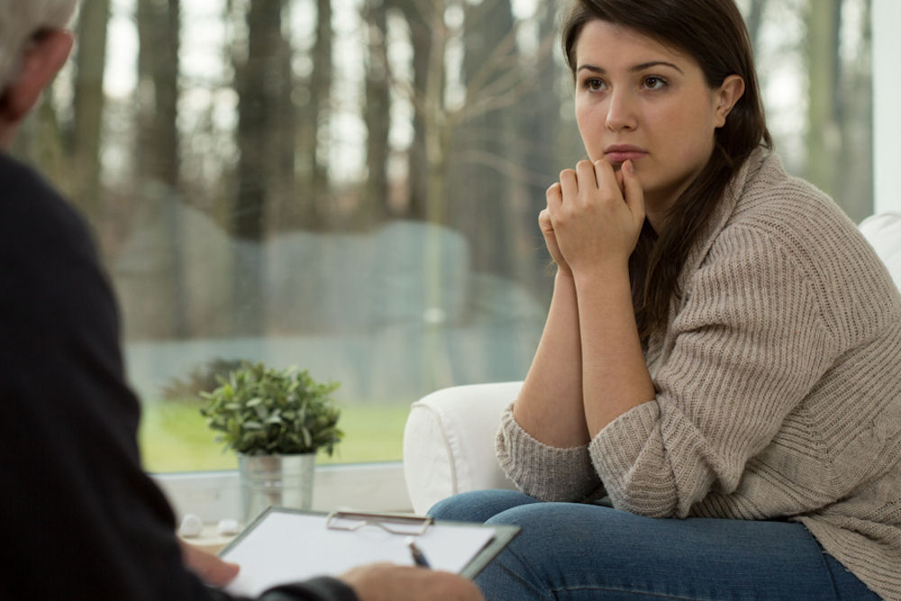 Young woman on psychotherapy session